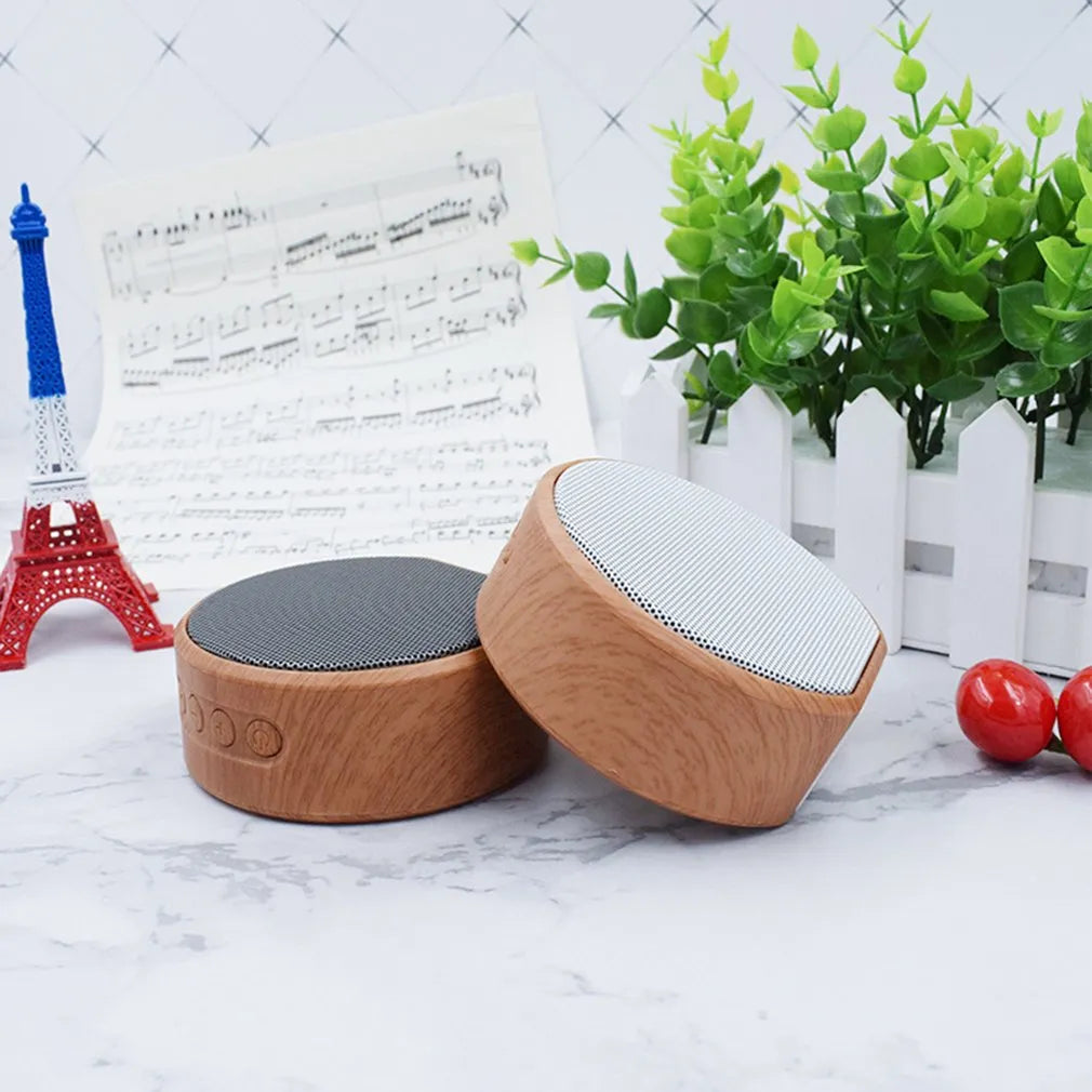 A60 wood grain wireless Bluetooth speaker in black with wood finish, 83x80x34 mm, 3W speaker
