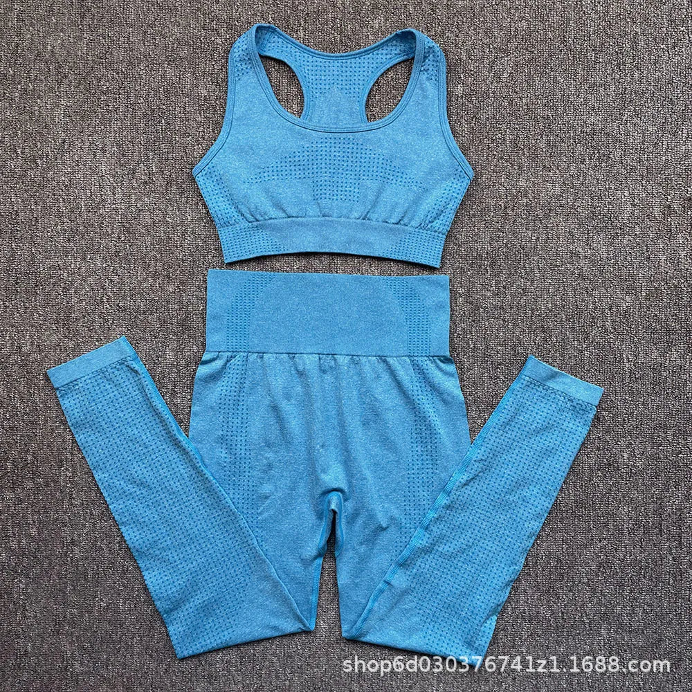 Three-piece yoga suit with long sleeve top, trousers, and bra in nylon blend, tight fit, sizes S to XL