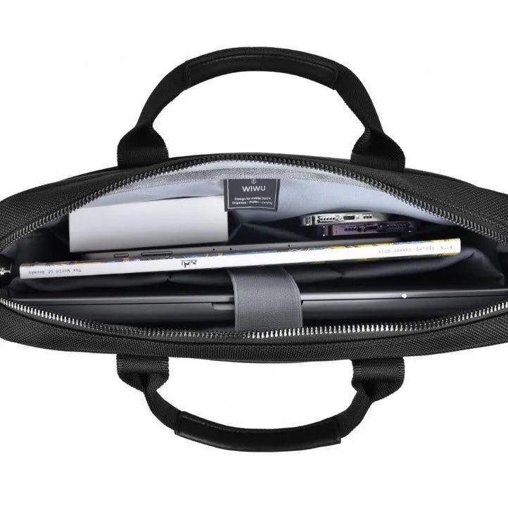 Black oxford cloth multi-pocket laptop handbag shown open, revealing separate padded computer layer and internal organisers.