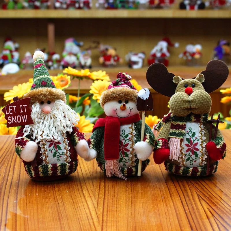Red, green and white flannel Christmas ornaments including snowman, old man and elk designs