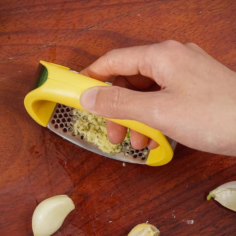 304 stainless steel garlic press with ergonomic handle in choice of colours