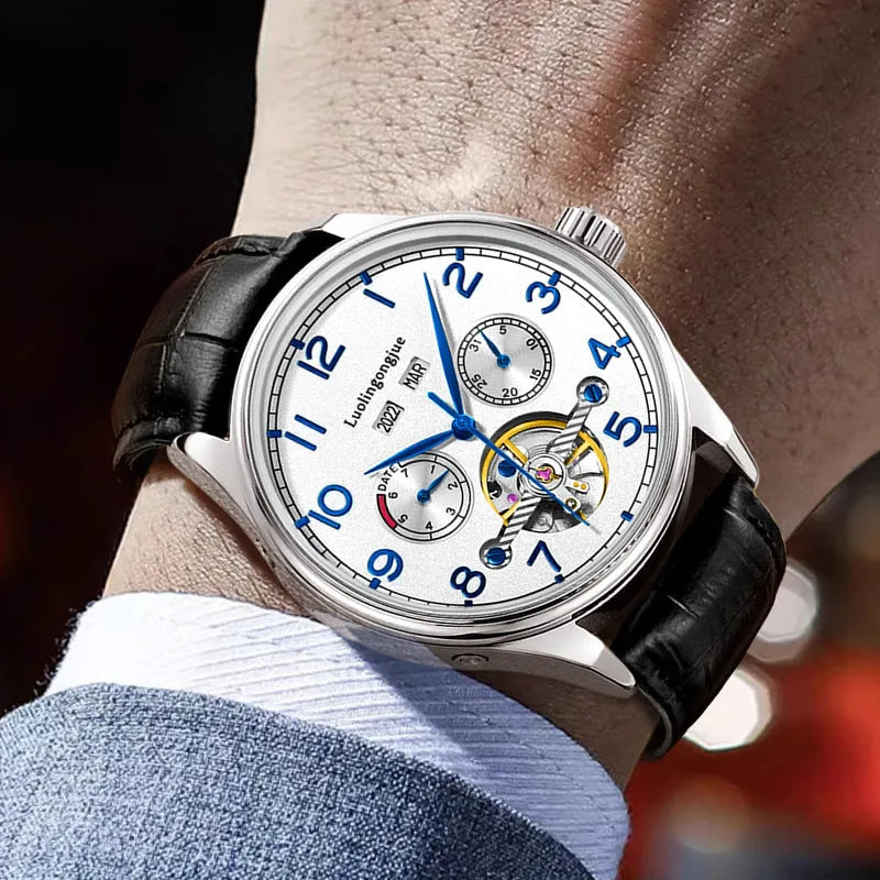 Men's stainless steel mechanical watch with hollow dial, sapphire glass, and leather strap.