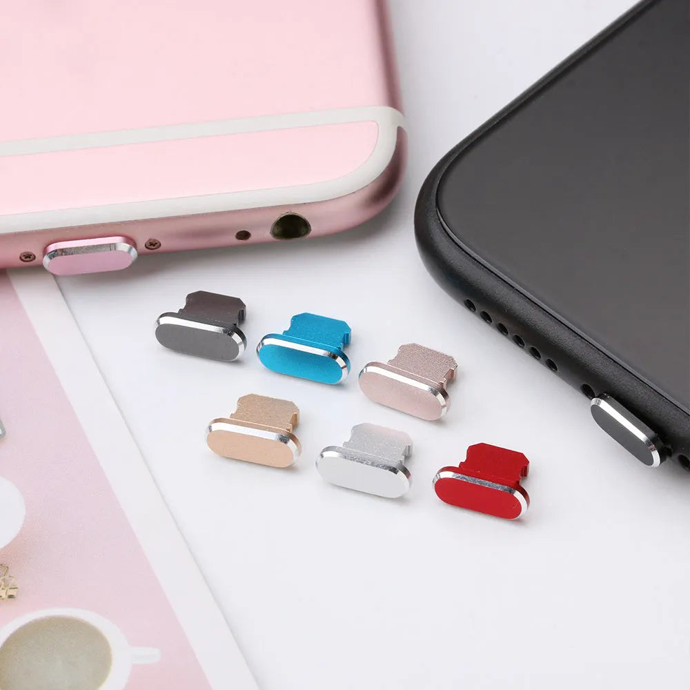 Aluminium alloy dust plug for iPhone charging port in various metallic colours.