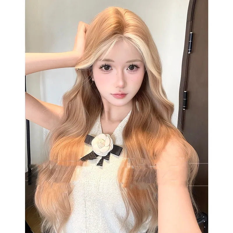 Long curly synthetic wig in American highlight gold colour with a natural one-word lace front.