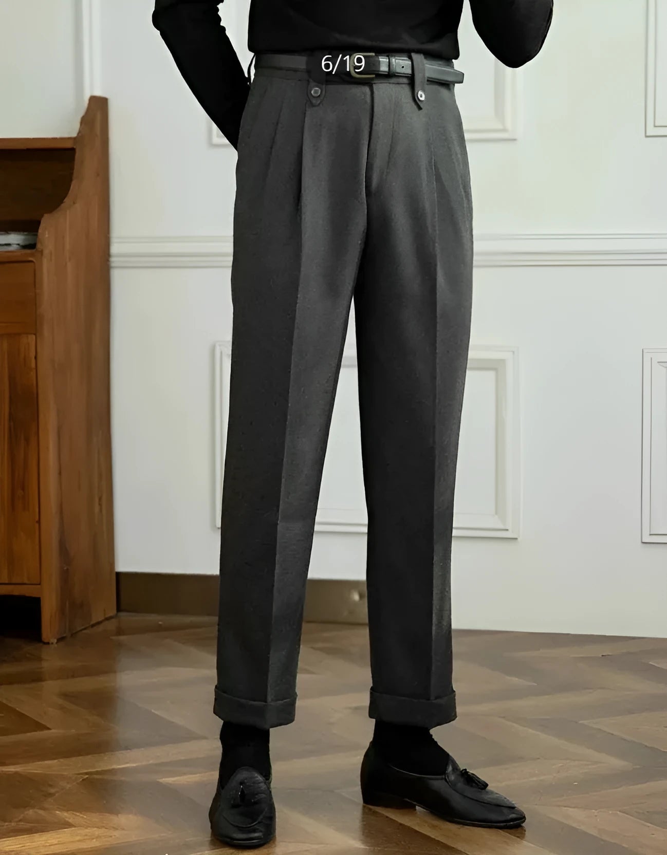 Grey straight high-waist casual trousers with elastic waistband on hanger