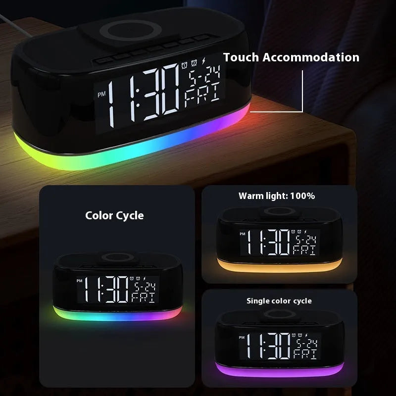 Deep black Bluetooth audio subwoofer with wireless charging pad and colourful light display