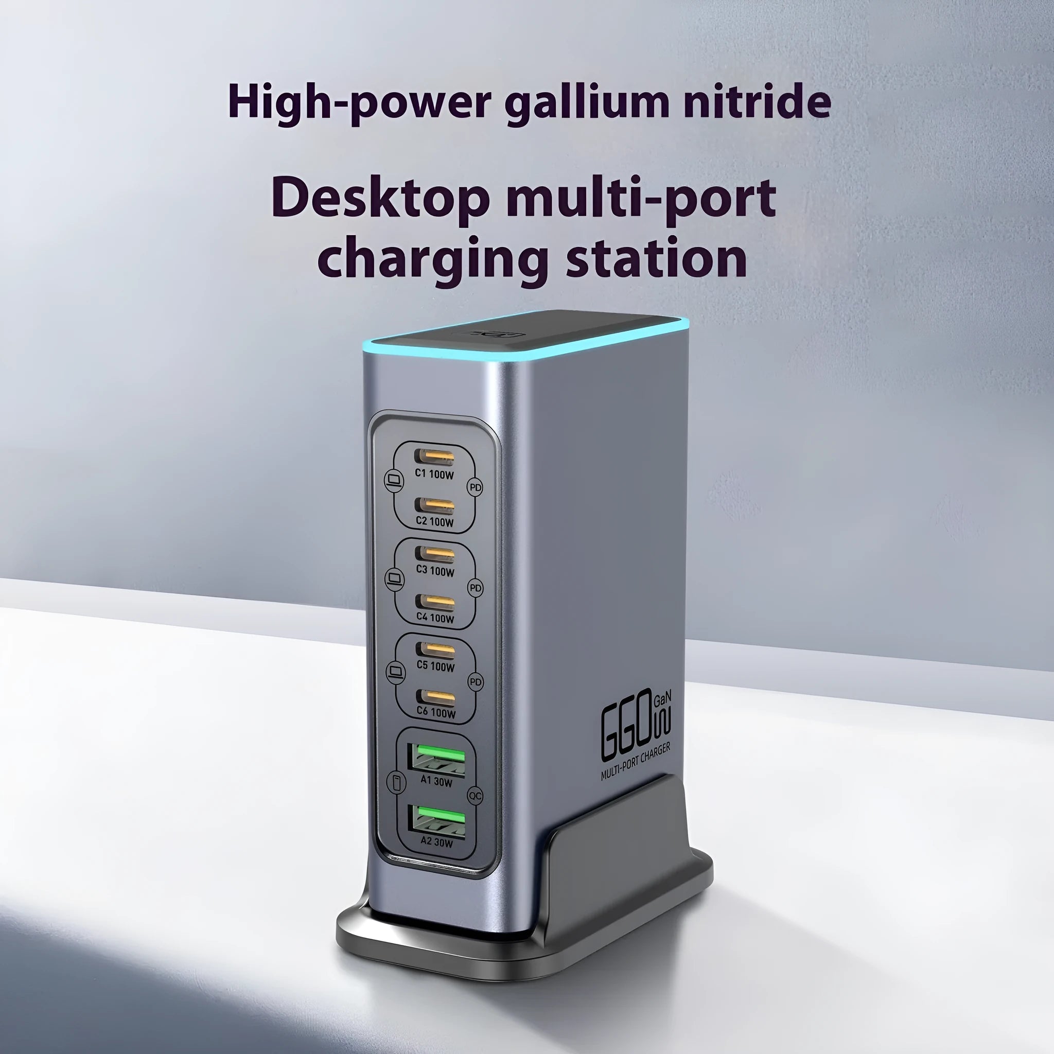 Silver 660W Gallium Nitride desktop fast charger with multiple USB-C ports on a wooden desk.