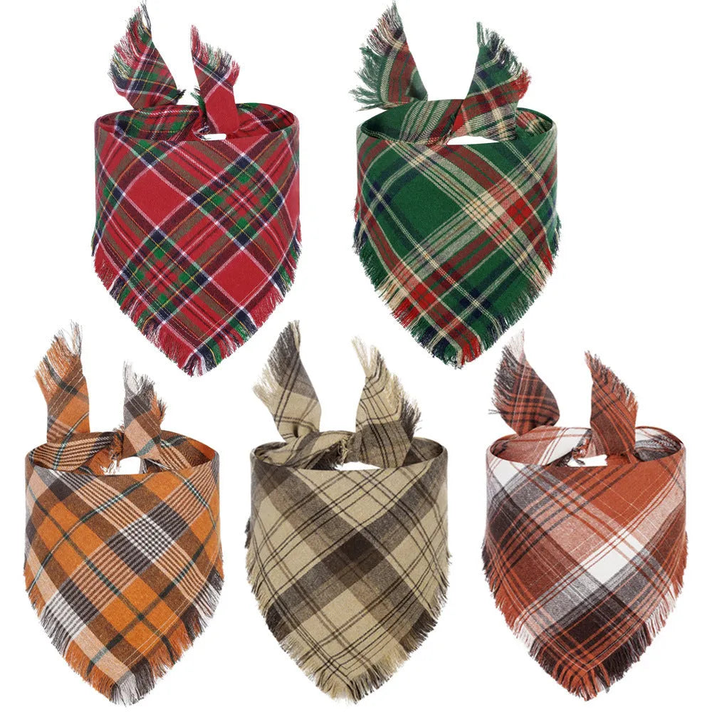 Classic plaid dog bandana with tassel edges in autumn colours of brown, green, orange, red, yellow.