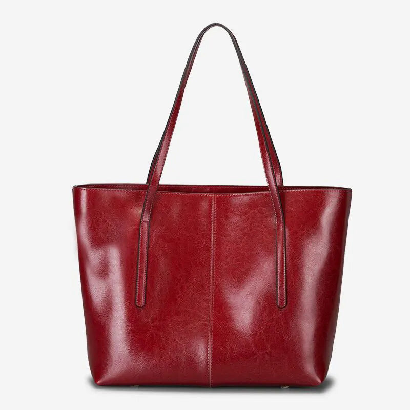 Women's shoulder bag in genuine cowhide leather with large capacity interior and retro styling