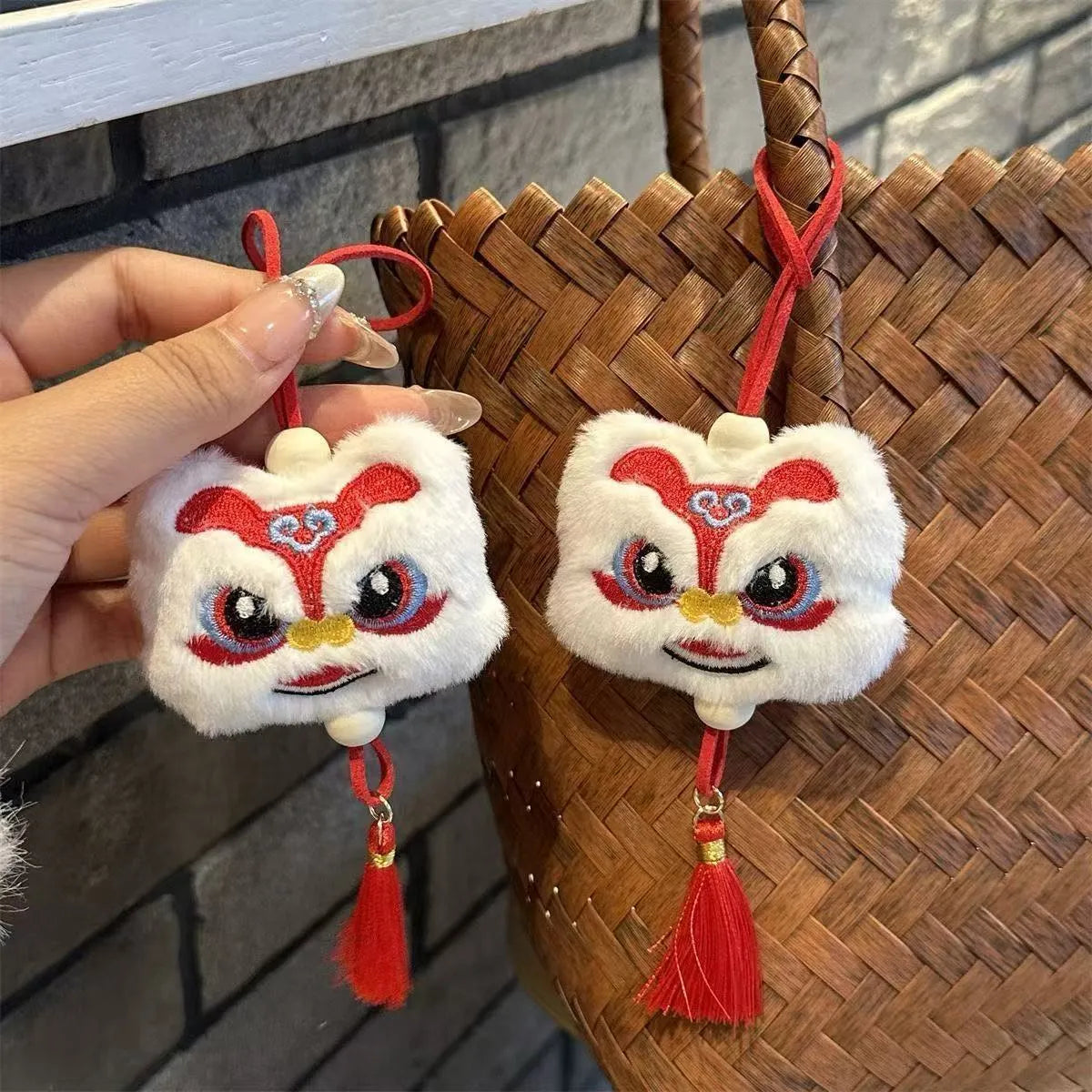 Chinese style plush lion keychain ornament with star stone detail in blue colour