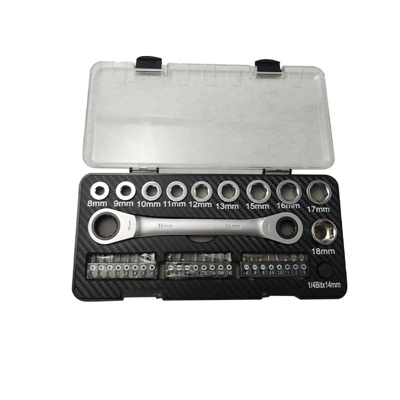 Dual-purpose ratchet wrench and screwdriver set with two-way mechanism, sockets, and bit heads on a workbench.