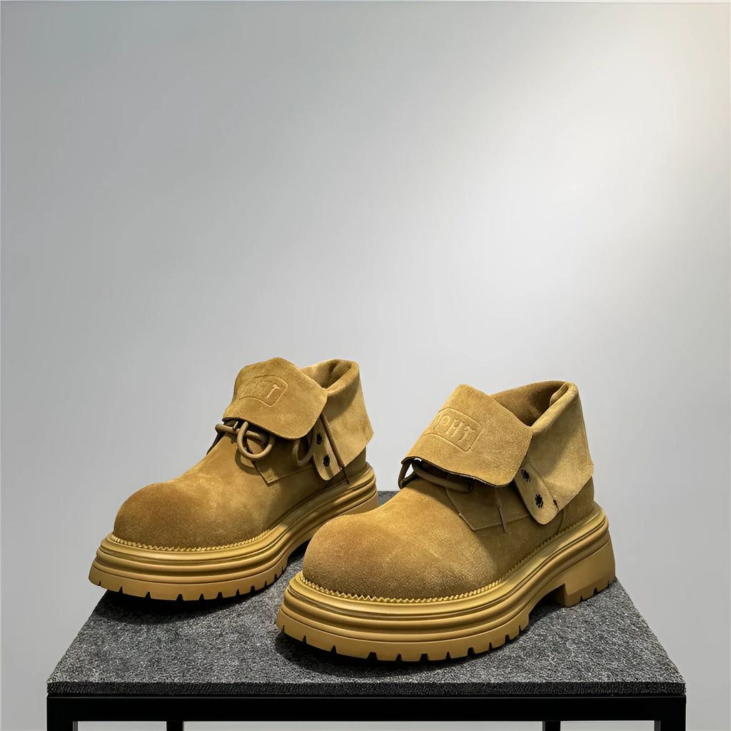 Retro distressed cow suede worker boots with thick soles in camel colour.