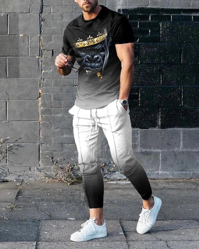 Men's grey polyester blend sport suit set with short sleeve T-shirt and matching trousers on a hanger.