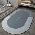Blended fabric non-slip floor mat in oval and rectangular shapes on a bathroom floor.