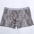 Men's loose leopard print underwear in milk silk polyester fabric showing mid waist design