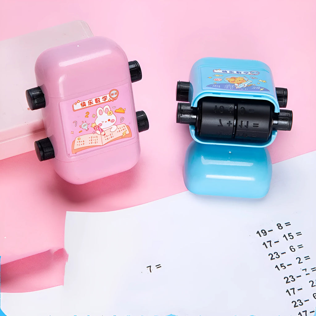 Children's maths stamp roller for addition subtraction multiplication division practice in pink plastic cuboid shape