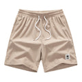 Man's drawstring waist summer shorts in blue, showing straight leg and casual fit