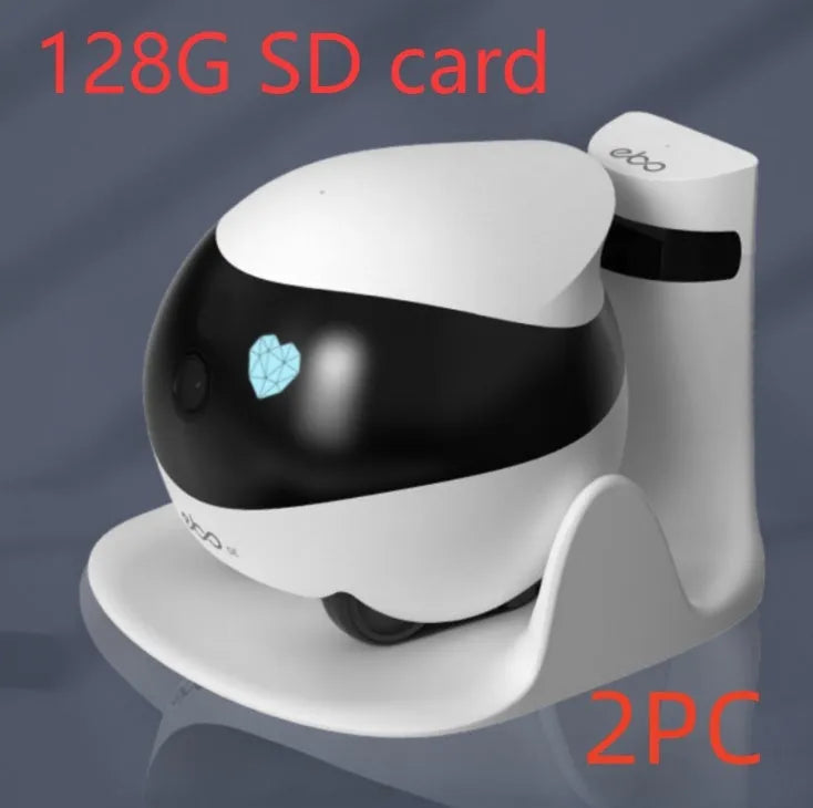 White smart home mobile surveillance robot camera on a docking station.