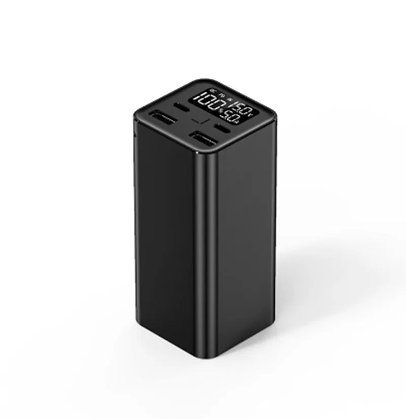 A black 65W high power laptop charging bank with a metal case, showing its dimensions.