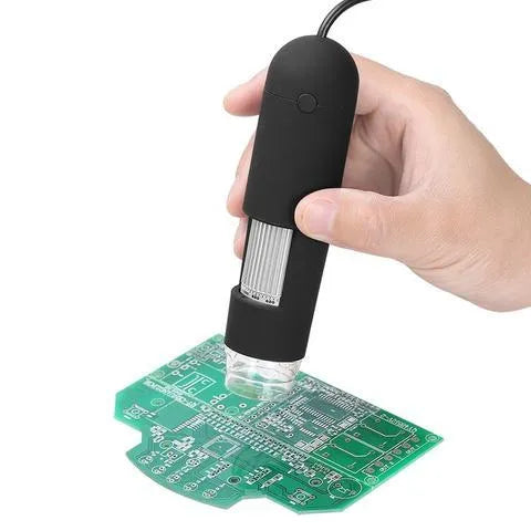 USB microscope camera with 8 white-light LEDs and manual focus ring, black casing, on white background