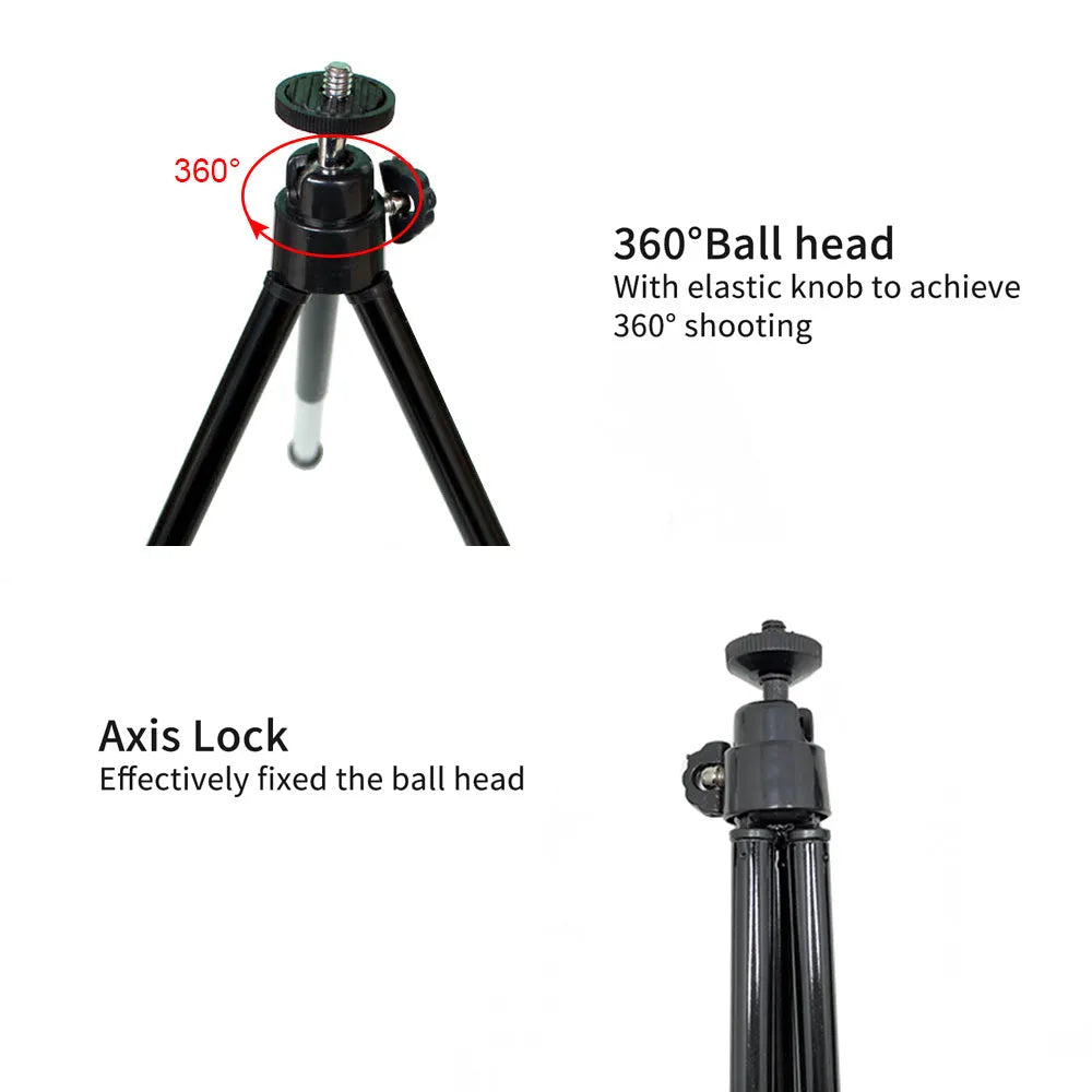 Compact mini desktop tripod with extendable aluminium legs and a black U-shaped phone clip attached.