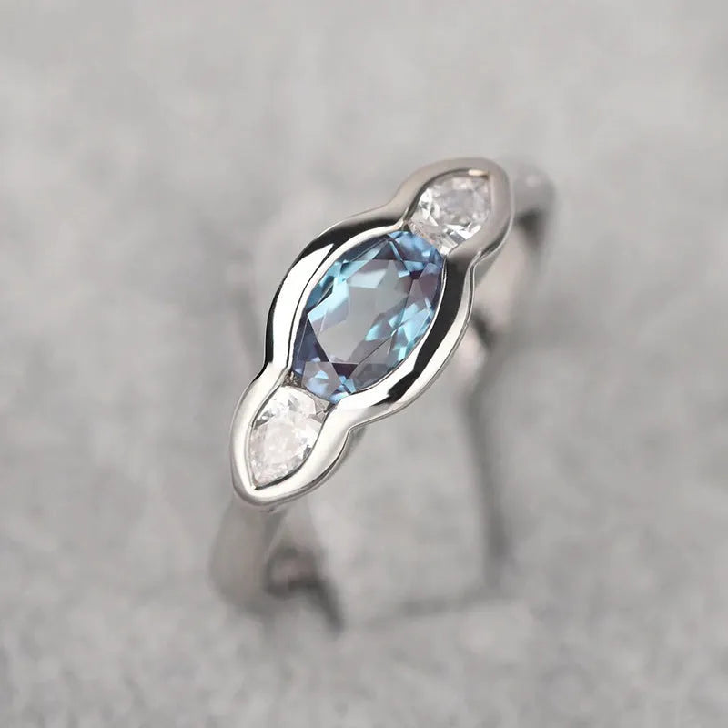 Geometric ellipse zircon ring in white gold colour on copper base