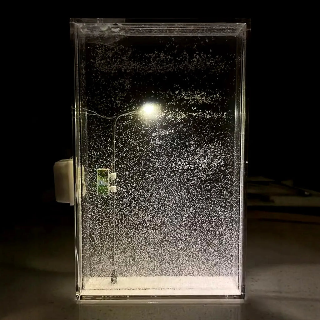 DIY magic snowy landscape night light kit with LED lights and snow effect for Christmas desktop decor.