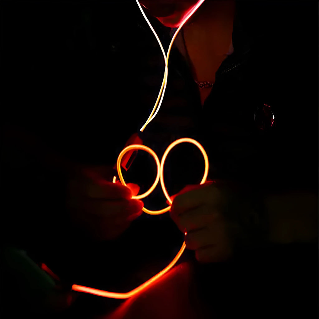 Blue Magic Light LED Earphones with illuminated EL light line and inline remote control.