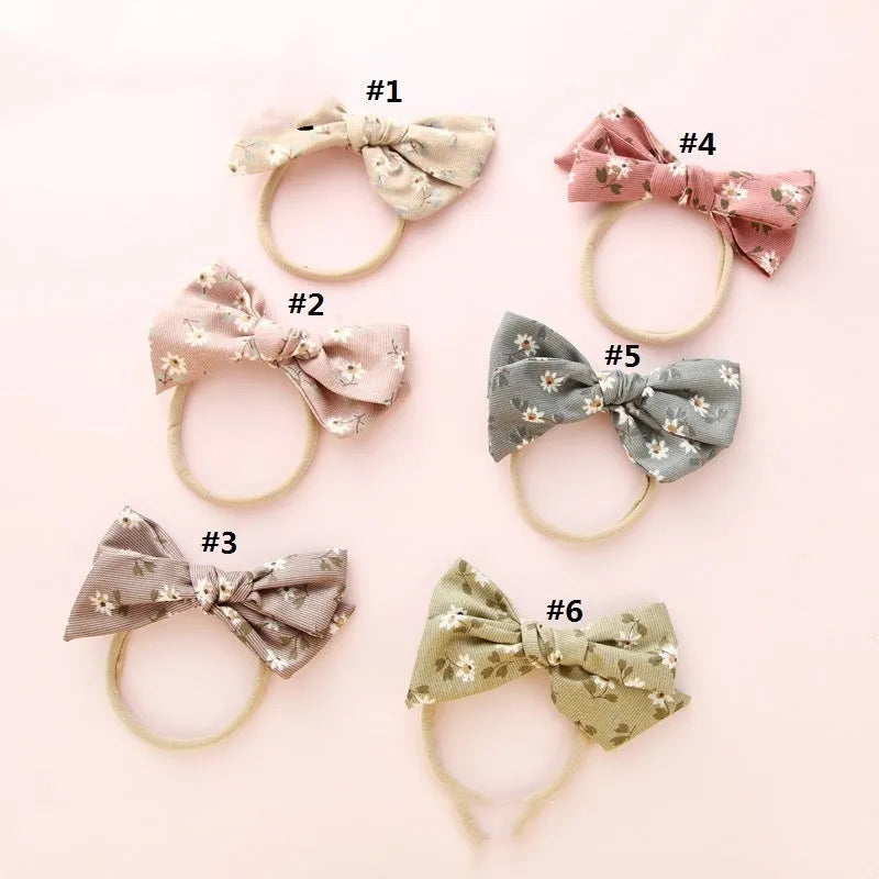 Children's knotted bow hair ring with fabric construction and printed patterns