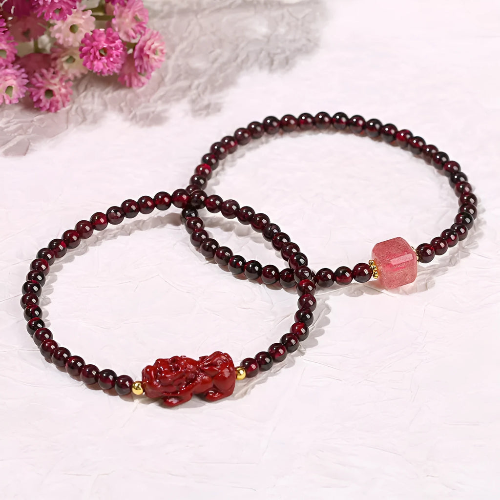 Geometric square garnet bracelet with strawberry quartz and purple sand pixiu charm.