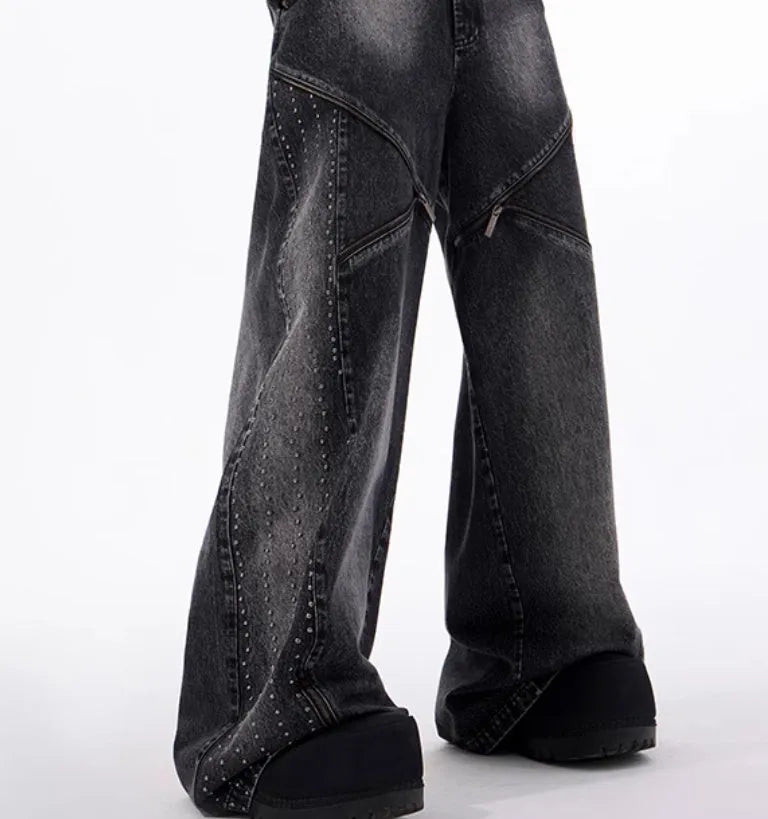 Black and grey washed denim wide leg trousers and vest set on a hanger