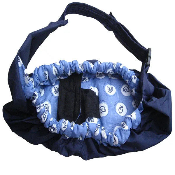 One-shoulder cross-arm baby carrier sling for newborns in a patterned fabric.