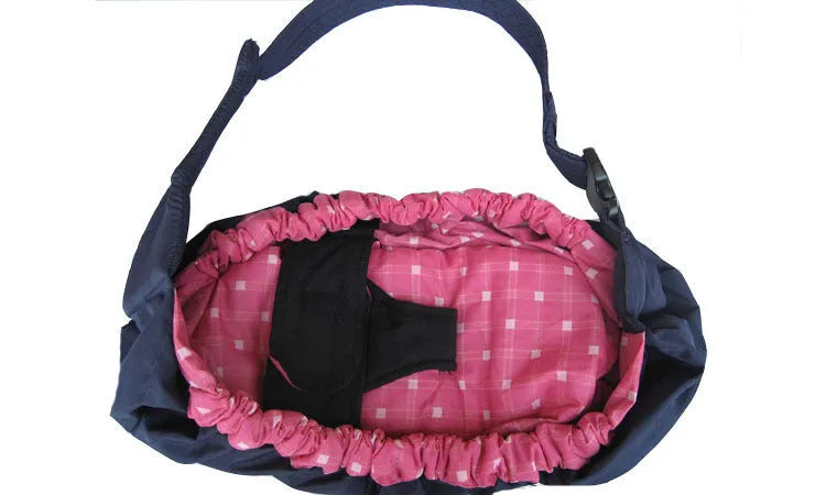 One-shoulder cross-arm baby carrier sling for newborns in a patterned fabric.