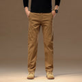 Men's cotton denim loose straight casual trousers in rust red with zip fly and elastic waist, front view
