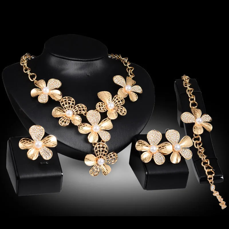 Gold alloy four-piece jewellery set with earrings necklace bracelet plant flower pattern in 18K gold