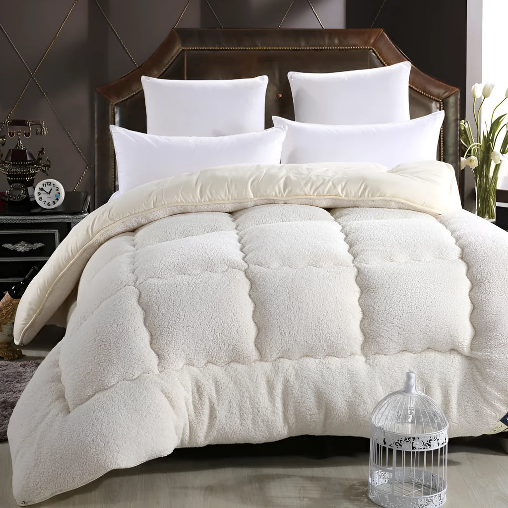 Goose down quilt with polyester shell in neutral colour, available in multiple sizes up to 220x240cm