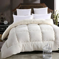 Goose down quilt with polyester shell in neutral colour, available in multiple sizes up to 220x240cm