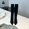 Women's pointed toe skinny boots below the knee in black artificial PU with side zipper and high heel
