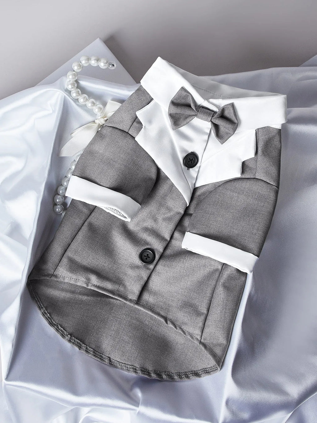Chinese-style four-legged polyester wedding suit for a dog or cat in black.