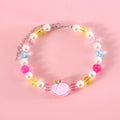Colourful plastic bead pet necklace for small cats and dogs in peach, rainbow, and small flower designs.