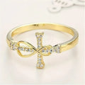 Geometric copper ring for women in gold colour finish, shown on a finger against a neutral background.