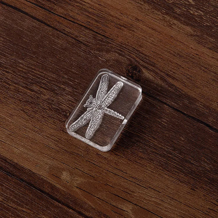Transparent acrylic hand seal with 12mm height showing dragonfly or Fei Xue fern design options
