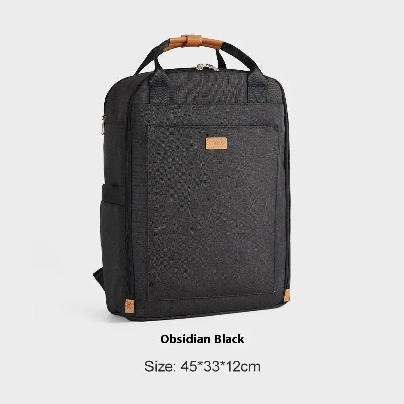 Unisex nylon backpack in black or creamy-white with curved shoulder strap and 20-35L business travel capacity