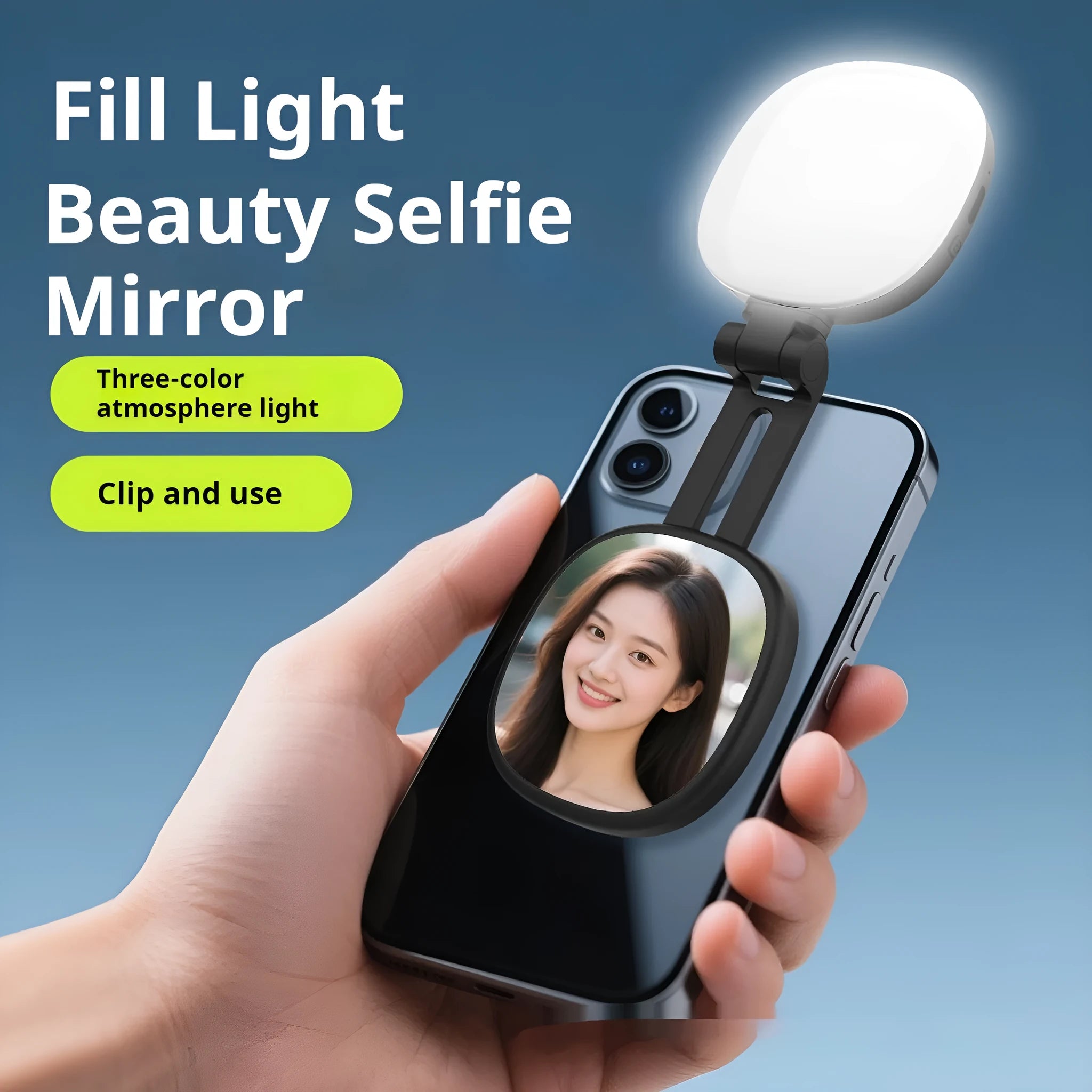 Black and white mini portable fill light with magnetic phone holder showing three colour temperature settings