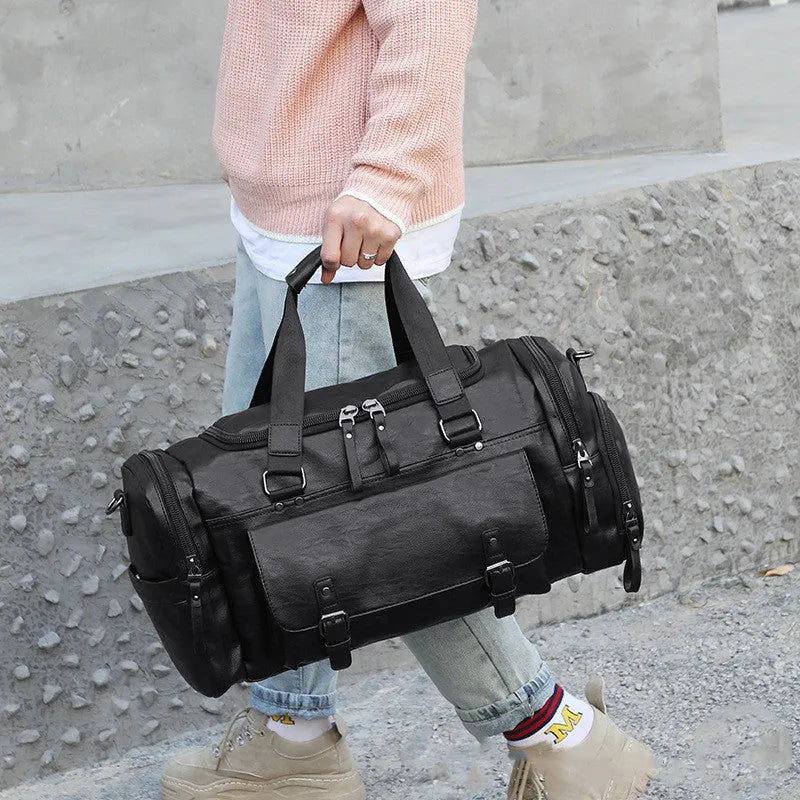 Black large capacity travel bag with separate shoe compartment for gym kit and holidays.