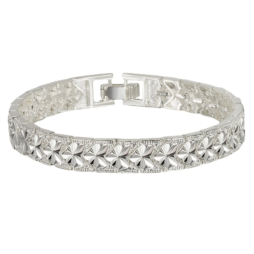 Silver electroplated copper bracelet for women with peach-shaped heart buckle closure on white background