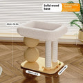 Pine wood cat nest with integrated grasping balls for scratching, shown in a simple style.