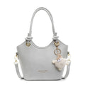 Small square PU crossbody bag in solid colour with zipper closure and single shoulder strap