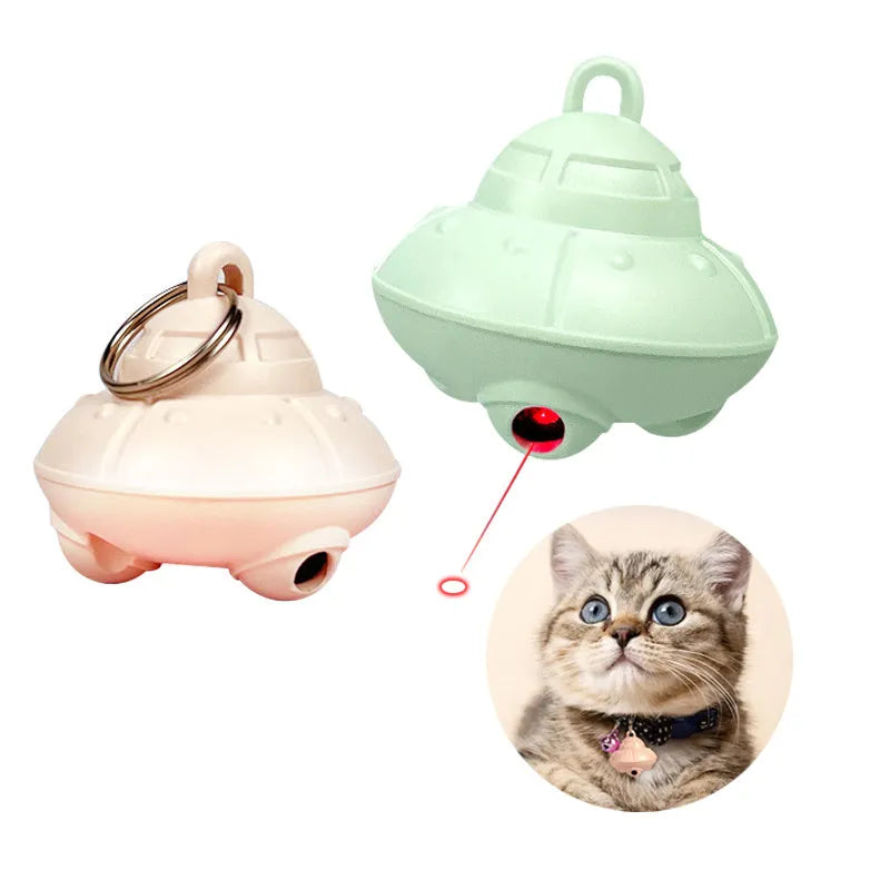 Automatic cat laser toy attached to green collar with USB charging port visible