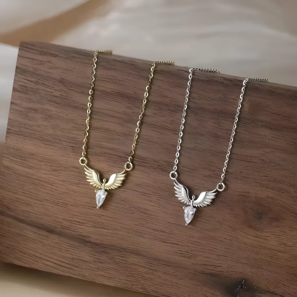 Close-up of a 925 silver eagle pendant on an adjustable O-ring chain necklace with an electroplated finish.
